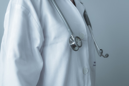 Female doctor with stethoscope standing with copy space. Medicine and healthy concept