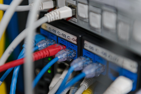 Network Switch and ethernet cables. Information Technology Computer Network