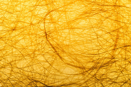 mulberry paper with warm light behind yellow translucent paper. use texture for backgroundの写真素材