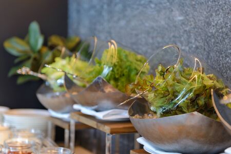 fresh vegetables salad in glass bowl on ice of breakfast buffet in the catering buffet food at hotel.の写真素材