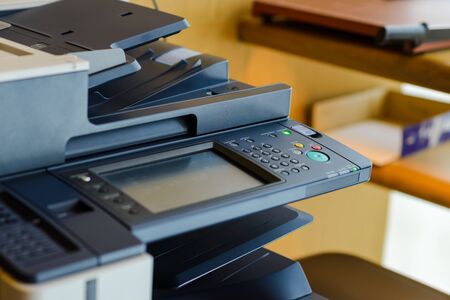 button on panel of copy machine or photocopier in officeの写真素材