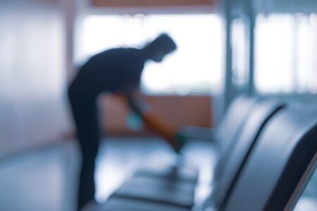 blurred image of housekeeper cleaning service working at office. Blur image use for background.の写真素材