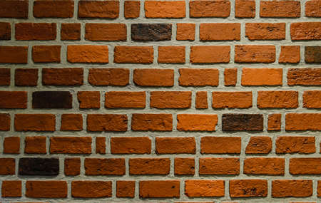 Orange colour bricks wall. Pattern. background