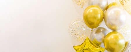 Golden and Silver colour balloons on white background with copy space for party decoration, New Year...