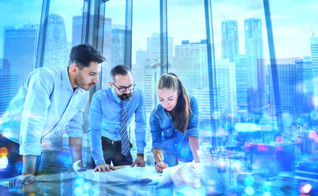 Engineers team meeting for architectural project. architects discussing blueprint with construction manager in office worker conference site. Construction Conceptの写真素材