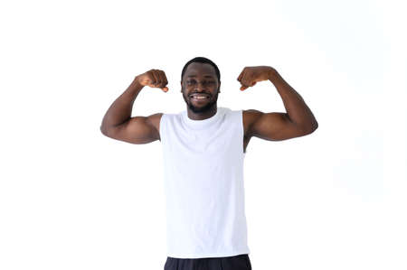 African American man posing with fitness clothes isolated over white background. Healthy and Fitness...