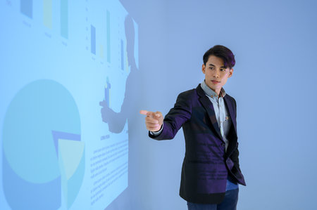 Business man gives presentation to colleagues during meeting, Shows Infographics Animation on Big...