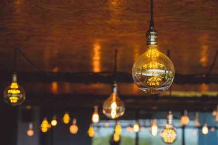 Beautiful vintage light bulb. Retro luxury light bulb hanging decor glowingの写真素材