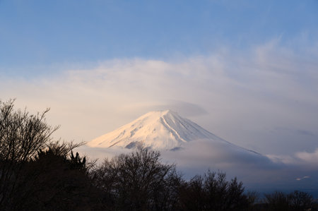 Fuji mountain at Lake Kawaguchiko in Yamanashi, Japan. Mount Fujisan with cloud cap on the peak in the morningの写真素材