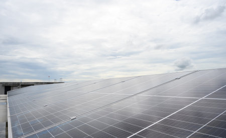 Photovoltaic solar panels are installed on rooftop of building. Regenerative energy system...