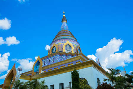 the colourful pagoda with blue sky at wat thaton Chiangmai Thailandの写真素材