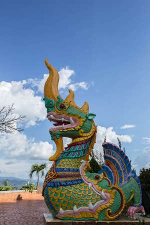 the colourful naga with blue sky at wat Thaton Chiangmai,Thailandの写真素材