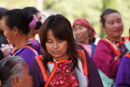 CHIANG MAI, THAILAND - FEB  4 : Unidentified  hill tribe was waitting for health service  with traditional clothes and silver jewelery at  Ban muang-ngam on january 27, 2014 in Chiang Mai, Thailand.のeditorial素材
