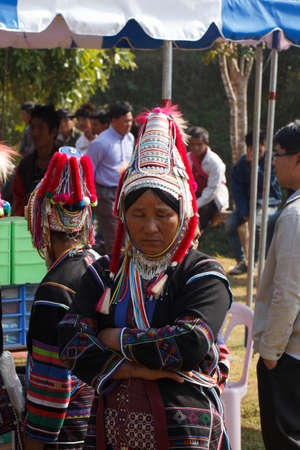 CHIANG MAI, THAILAND - FEB  4 : Unidentified  hill tribe was waitting for health service  with traditional clothes and silver jewelery at  Ban muang-ngam on january 27, 2014 in Chiang Mai, Thailand.のeditorial素材