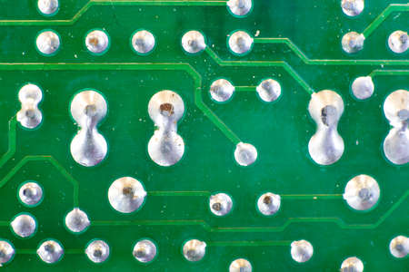 Closeup of dirty electronic circuit board
