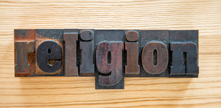 religion written in old-fashioned wooden lettersの写真素材