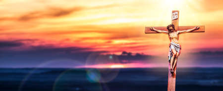 Jesus Christ crucifixion. Holy God Jesus sacrifice on cross. Christianity symbol. Panoramic view.の写真素材