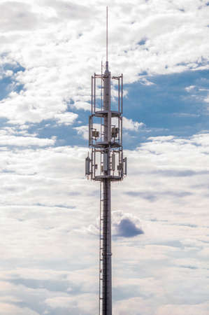 5G network tower antenna. Telecommunication antenna with sky in the backgroundの写真素材