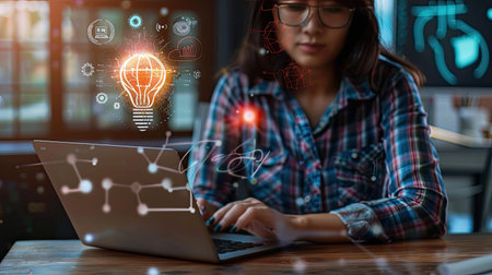 entrepreneur brainstorming innovative business ideas and market strategies on a laptopの素材