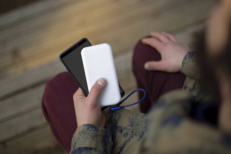 mobile phone charging white powerbank