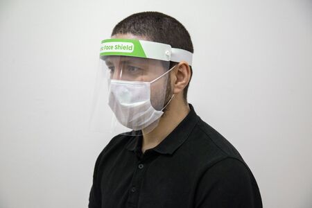 coronavirus green face protection visorの写真素材