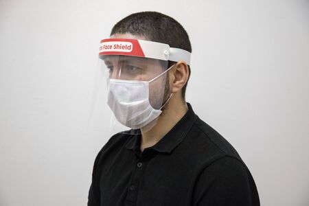 coronavirus red face protection visorの写真素材
