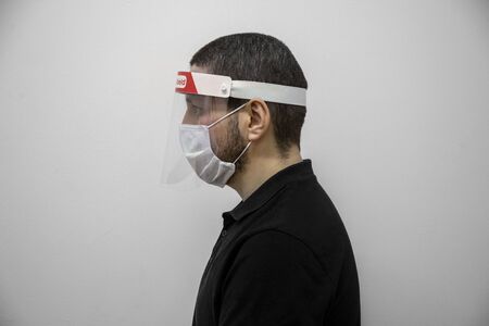 coronavirus red face protection visorの写真素材
