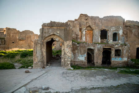 Facade of old abandoned building in Iraqの写真素材