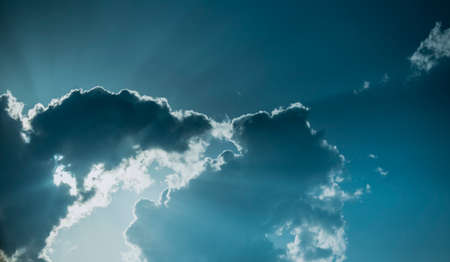 Sun behind sky in spring seasonの写真素材