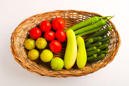 Raw vegetable in wooden basket