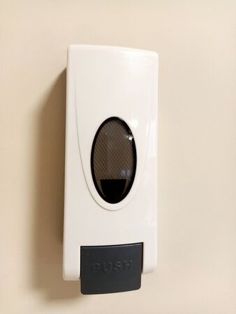 Hand sanitizer dispenser