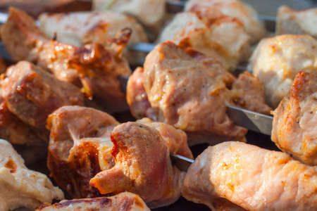 close-up  tasty shish kebabs on skewersの写真素材