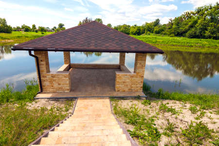 Beautiful alcove on a lake in sunny dayの写真素材