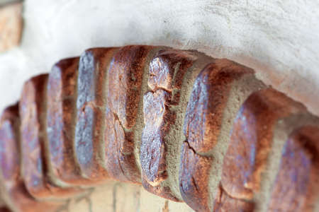 Yellow and orange old bricks in form of archの写真素材