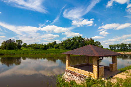 Beautiful alcove on a lake in sunny dayの写真素材