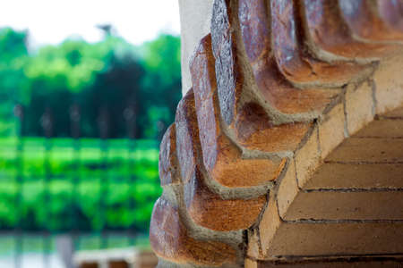 Yellow and orange old bricks in form of archの写真素材