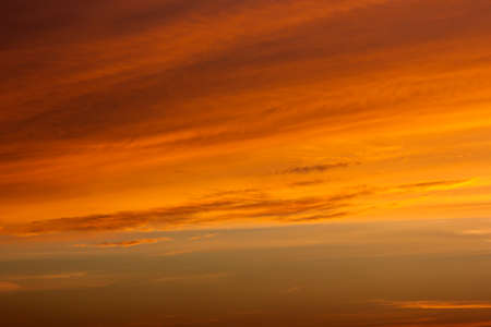 Yellow and orange dramatic sunset skyの写真素材
