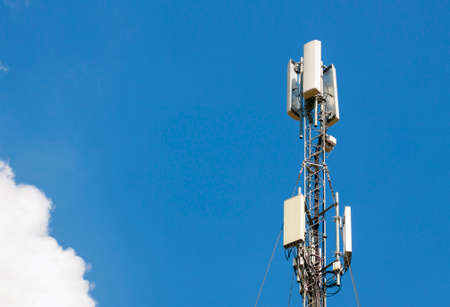 Communication antenna tower with blue sky,Telecoms technology. Mobile phone base station