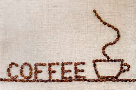 Burlap Sackcloth Canvas and Coffee Beans Photo Background. Copy Space. Coffee Borderの写真素材