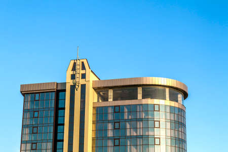 Fragment of facade wall of modern glass skyscraper