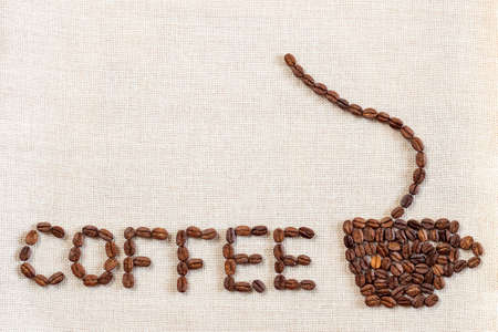 Burlap Sackcloth Canvas and Coffee Beans Photo Background. Copy Space. Coffee Borderの写真素材
