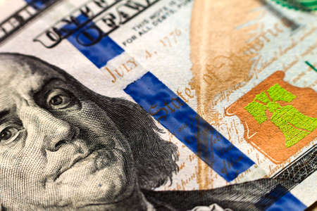 US one hundred dollar bills money backgroundの写真素材