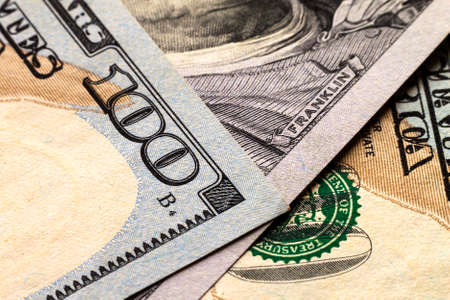 US one hundred dollar bills money backgroundの写真素材