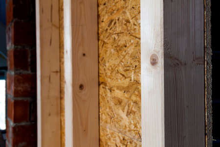 Close up detail of house construction wooden wall elements. Interior frame renovation workの写真素材