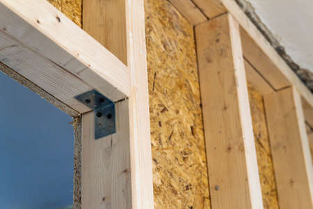 Close up detail of house construction wooden wall elements. Interior frame renovation workの写真素材
