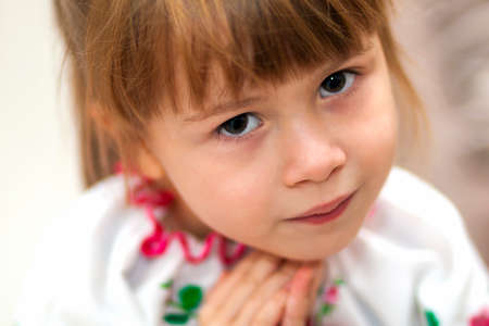 Close-up portrait of pretty little child girl