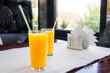 Two glasses of orange juice. Healthy drink concept.の写真素材