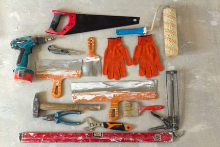 Construction tooling for renovation work, maintenance concept. Old used toolsの写真素材