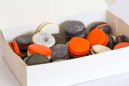 Set of different french cookies macaroons in a paper box.の写真素材