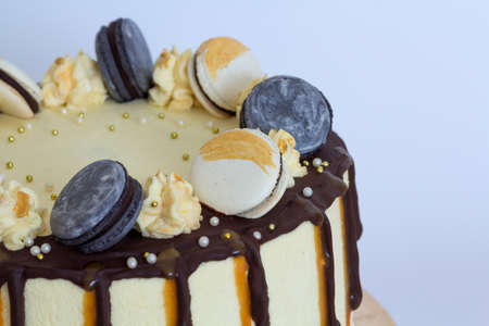 Beautiful sweet cake, close up of cake with macaroons